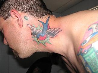 Click image for larger version

Name:	neck tat 1.jpg
Views:	51
Size:	31.8 KB
ID:	181498