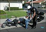 Click image for larger version

Name:	baby cop.jpg
Views:	199
Size:	26.9 KB
ID:	1908