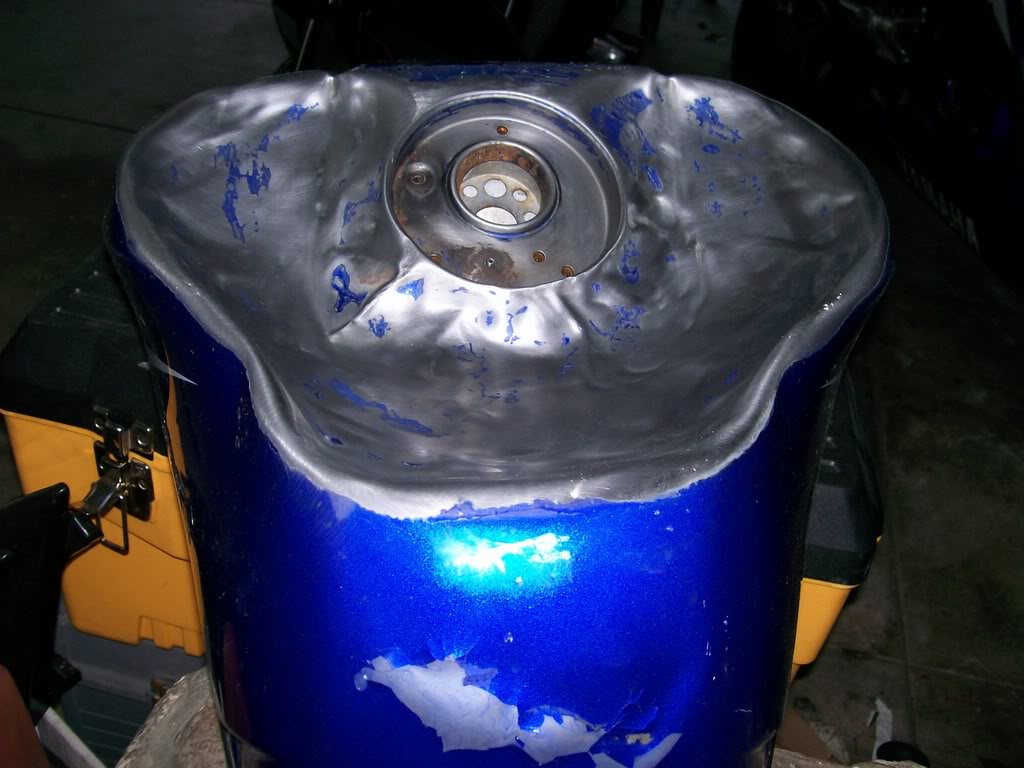 Name:  tankdentpaintstripped.jpg
Views: 196
Size:  99.4 KB