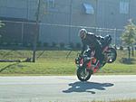 Click image for larger version

Name:	11-17 one handed stoppie.jpg
Views:	146
Size:	32.5 KB
ID:	5575