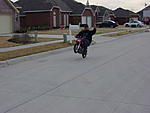 Click image for larger version

Name:	me fiddy wheelie one-handed.jpg
Views:	231
Size:	58.4 KB
ID:	8057