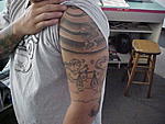 Click image for larger version

Name:	TATTOO LEFT ARM.jpg
Views:	26
Size:	32.3 KB
ID:	91514