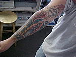 Click image for larger version

Name:	TATTOO RGHT ARM 2.jpg
Views:	26
Size:	31.7 KB
ID:	91515