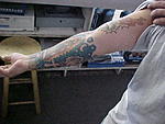 Click image for larger version

Name:	TATTOO RGHT RAM 3.jpg
Views:	25
Size:	30.7 KB
ID:	91516